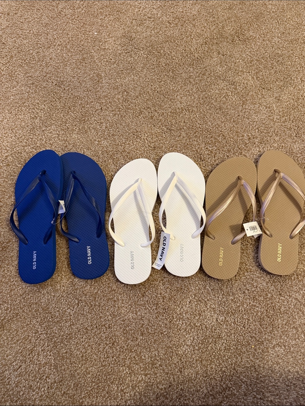3 pair Old Navy Flip Flops - Blue, White, Tan